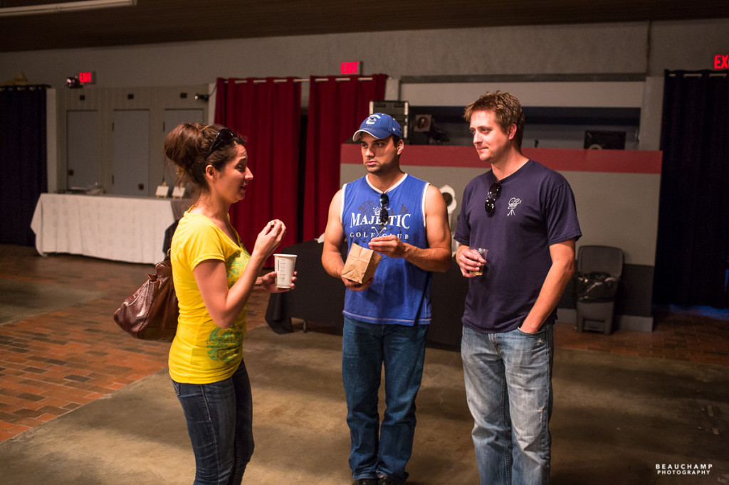 Left to right, Full Moon Cafe organizer and musician Briege Kealey chatting with actor and musician Travis L. Fowler and filmmaker Gordie Haakstad.